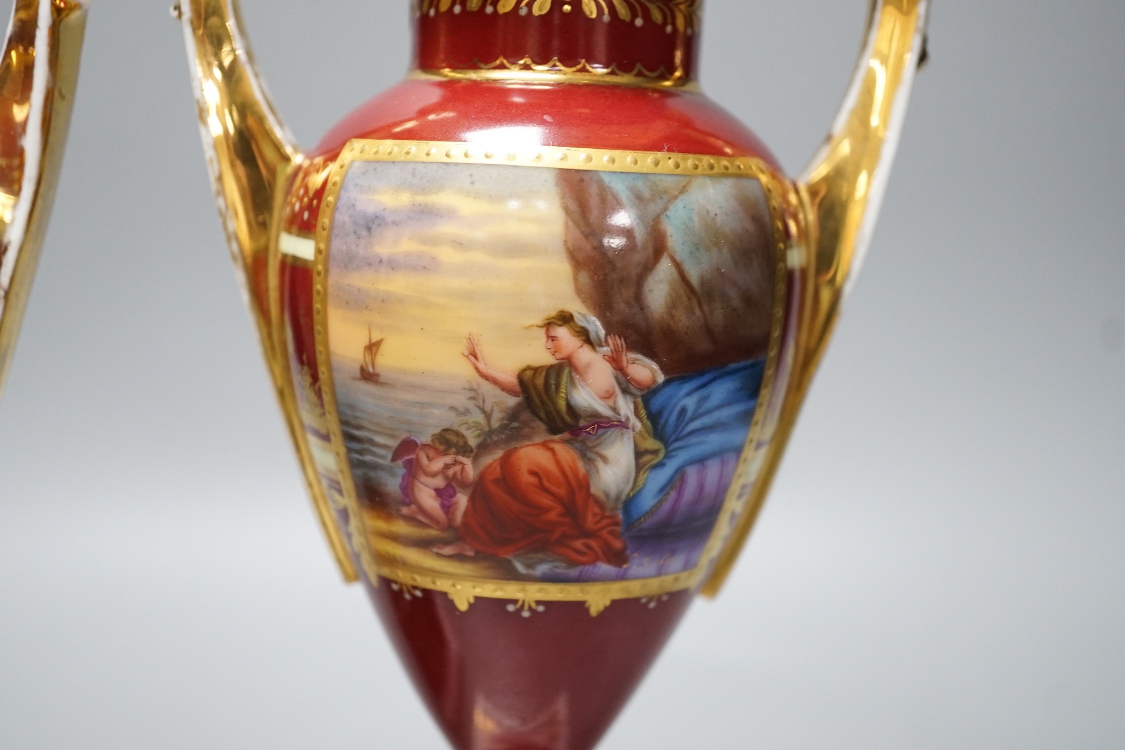 A pair of Vienna style painted porcelain vases, early 20th century 25cm